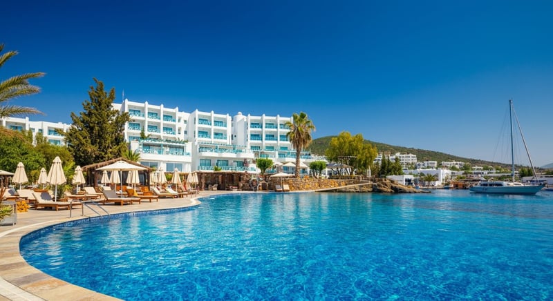 Family enjoying sunny vacation at top Bodrum hotel