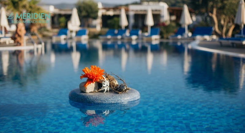 Family enjoying vacation at top Bodrum hotel with sunny beach view