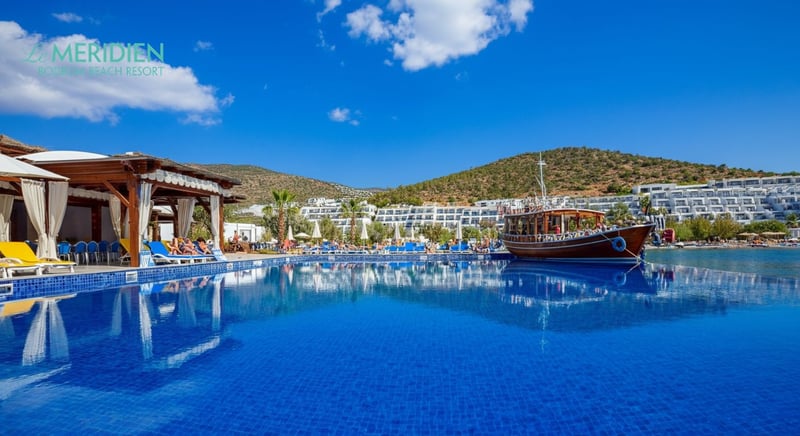 Family enjoying sunny day at top Bodrum hotel
